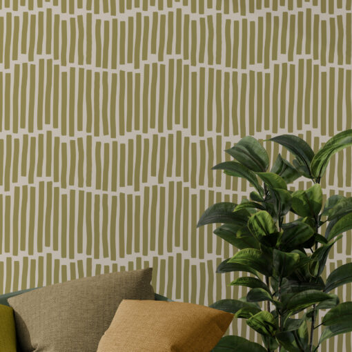 Green earthy wallpaper in living room with modern chair and plant