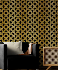 Gold and black art deco wallpaper in living room with wooden cabinet