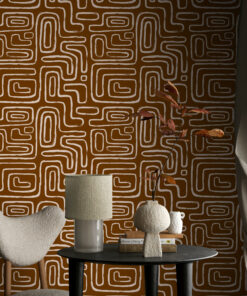 orange brown organic line art wallpaper in room corner with table and chair