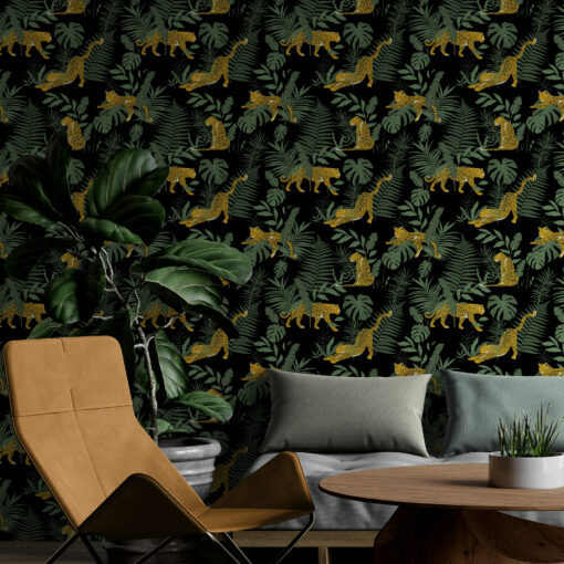 Black and green tropical cheetah print wallpaper in a modern living room with leaf plant
